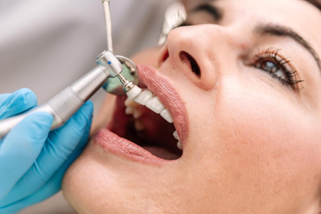 patient undergoing a deep dental cleaning