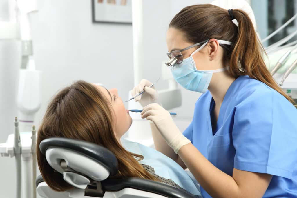 Patient getting a dental cleaning