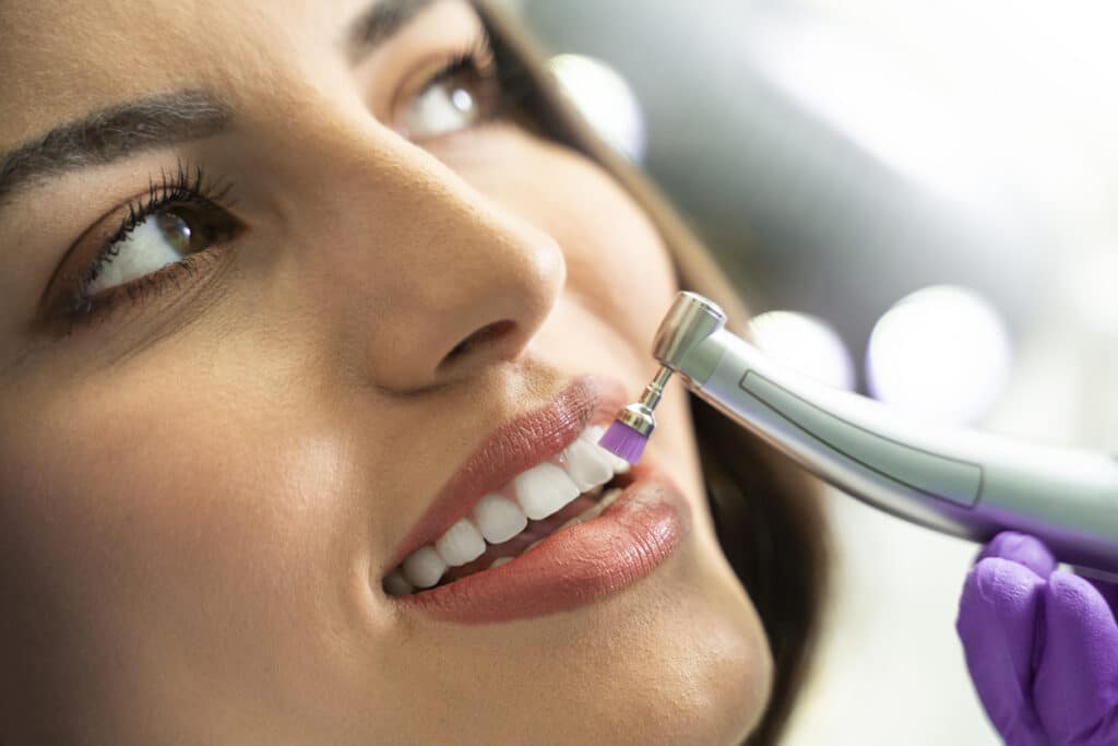 Patient receiving a professional dental cleaning