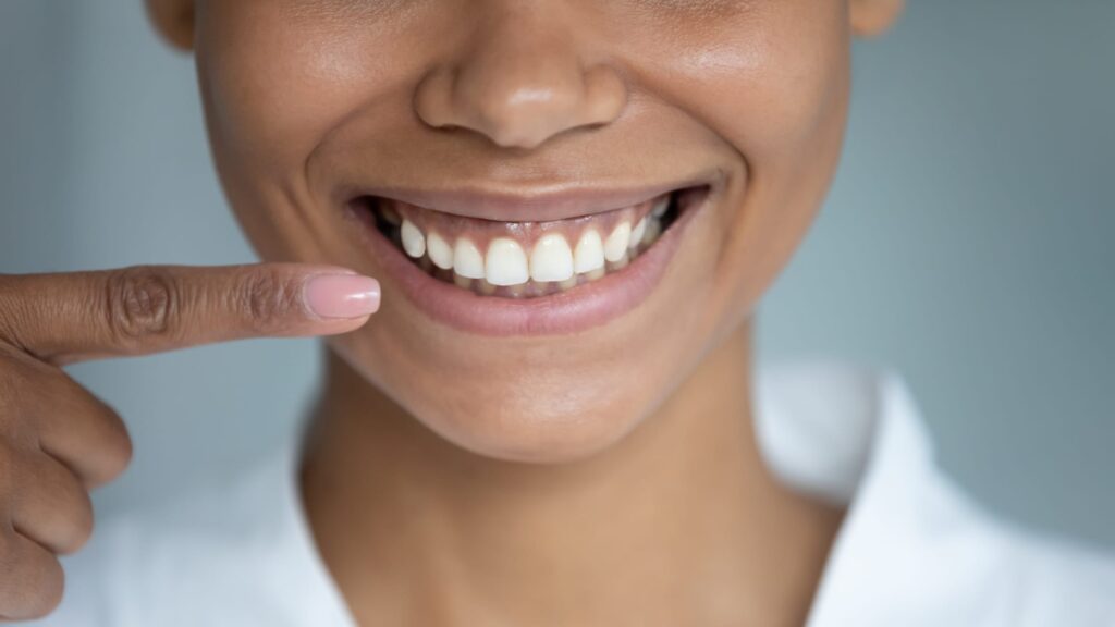 Patient smiling with flawless teeth